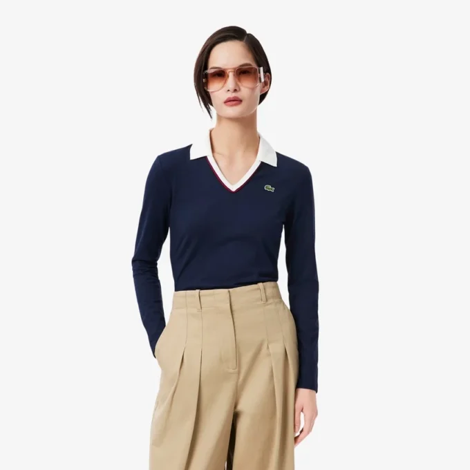 Polo da donna slim fit con dettagli rifiniti e maniche lunghe Polo da donna slim fit con dettagli rifiniti e maniche lunghe