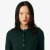 Polo da donna slim fit L.12.12 in tessuto elasticizzato Mini Piqua Polo da donna slim fit L.12.12 in tessuto elasticizzato Mini Piqua