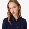 Polo da donna slim fit L.12.12 in tessuto elasticizzato Mini Piqua Polo da donna slim fit L.12.12 in tessuto elasticizzato Mini Piqua