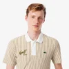 Polo da golf a righe termoregolante da uomo