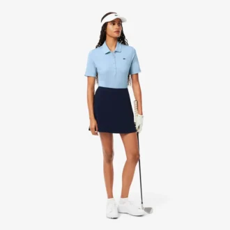 Polo da golf elasticizzata slim fit con protezione UV da donna