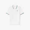Polo da tennis da donna con colletto a righe e protezione UV Polo da tennis da donna con colletto a righe e protezione UV