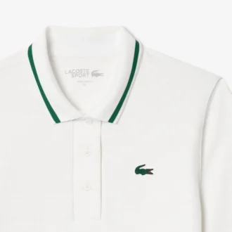 Polo da tennis da donna con colletto a righe e protezione UV