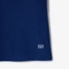 Polo da tennis da donna con colletto a righe e protezione UV Polo da tennis da donna con colletto a righe e protezione UV