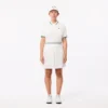 Polo da tennis da donna con colletto a righe e protezione UV Polo da tennis da donna con colletto a righe e protezione UV