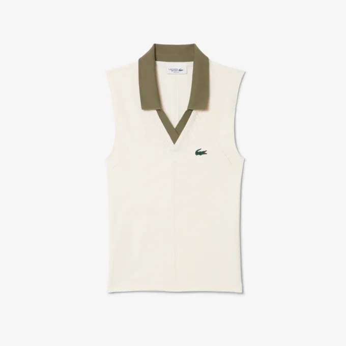 Polo da tennis da donna senza maniche in maglia elasticizzata Polo da tennis da donna senza maniche in maglia elasticizzata