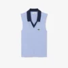 Polo da tennis da donna senza maniche in maglia elasticizzata Polo da tennis da donna senza maniche in maglia elasticizzata