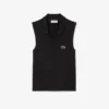 Polo da tennis da donna senza maniche in maglia elasticizzata Polo da tennis da donna senza maniche in maglia elasticizzata