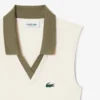 Polo da tennis da donna senza maniche in maglia elasticizzata Polo da tennis da donna senza maniche in maglia elasticizzata