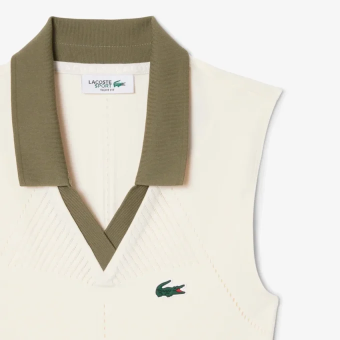 Polo da tennis da donna senza maniche in maglia elasticizzata Polo da tennis da donna senza maniche in maglia elasticizzata