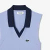 Polo da tennis da donna senza maniche in maglia elasticizzata Polo da tennis da donna senza maniche in maglia elasticizzata