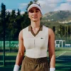 Polo da tennis da donna senza maniche in maglia elasticizzata Polo da tennis da donna senza maniche in maglia elasticizzata