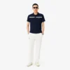 Polo da tennis Heritage da uomo con badge Ultra Dry Polo da tennis Heritage da uomo con badge Ultra Dry