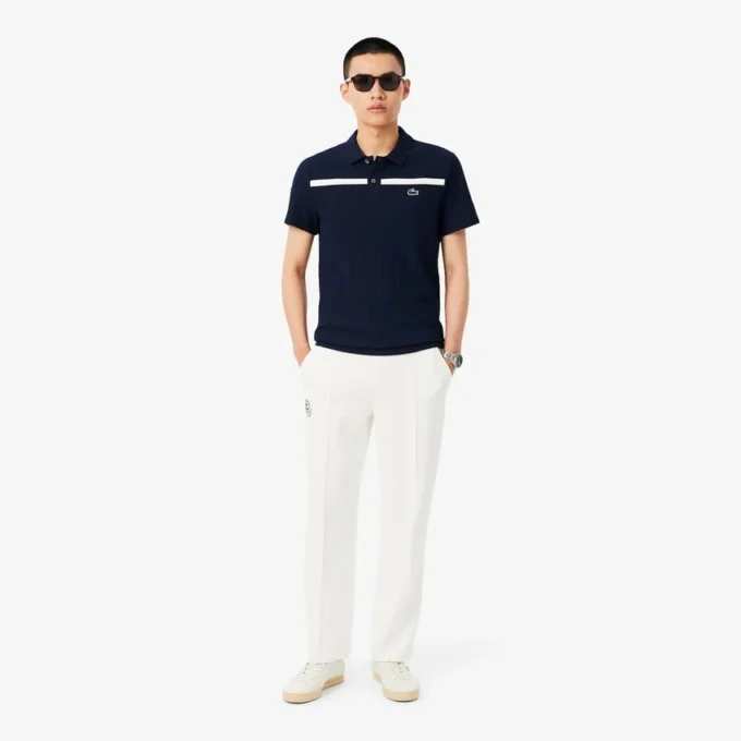 Polo da tennis Heritage da uomo con badge Ultra Dry Polo da tennis Heritage da uomo con badge Ultra Dry