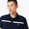 Polo da tennis Heritage da uomo con badge Ultra Dry Polo da tennis Heritage da uomo con badge Ultra Dry