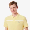 Polo da tennis Heritage da uomo con badge Ultra Dry Polo da tennis Heritage da uomo con badge Ultra Dry