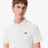 Polo da tennis Heritage da uomo con badge Ultra Dry Polo da tennis Heritage da uomo con badge Ultra Dry