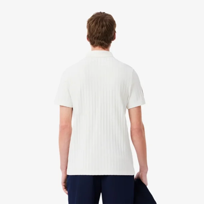 Polo da tennis Heritage da uomo con badge Ultra Dry Polo da tennis Heritage da uomo con badge Ultra Dry