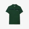 Polo da tennis Heritage da uomo con badge Ultra Dry Polo da tennis Heritage da uomo con badge Ultra Dry