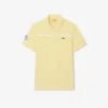 Polo da tennis Heritage da uomo con badge Ultra Dry Polo da tennis Heritage da uomo con badge Ultra Dry