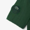 Polo da tennis Heritage da uomo con badge Ultra Dry Polo da tennis Heritage da uomo con badge Ultra Dry