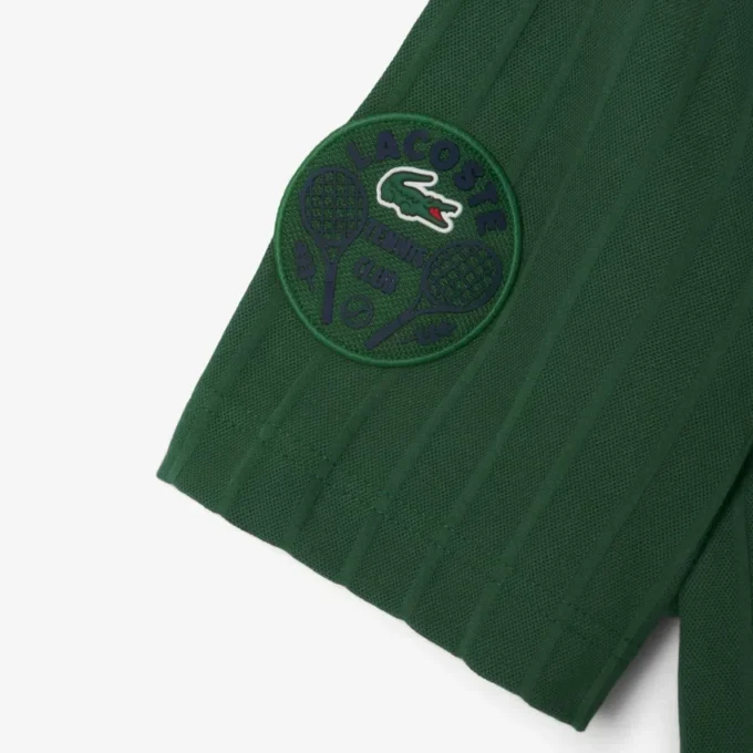 Polo da tennis Heritage da uomo con badge Ultra Dry Polo da tennis Heritage da uomo con badge Ultra Dry