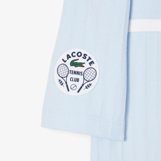 Polo da tennis Heritage da uomo con badge Ultra Dry Polo da tennis Heritage da uomo con badge Ultra Dry