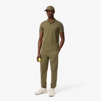 Polo da tennis Ultra Dry con strisce del marchio da uomo