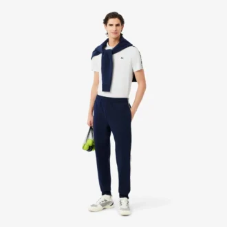 Polo da tennis Ultra Dry con strisce del marchio da uomo