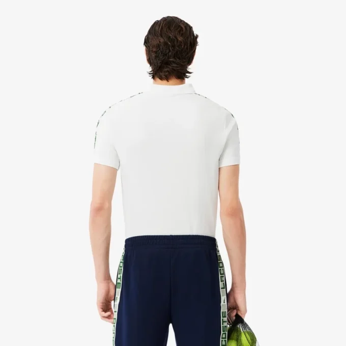 Polo da tennis Ultra Dry con strisce del marchio da uomo Polo da tennis Ultra Dry con strisce del marchio da uomo