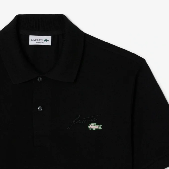 Polo da uomo in piqué con dettagli ricamati e vestibilità classica Polo da uomo in piqué con dettagli ricamati e vestibilità classica
