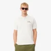 Polo da uomo in piqué con motivo ricamato e vestibilità classica Polo da uomo in piqué con motivo ricamato e vestibilità classica