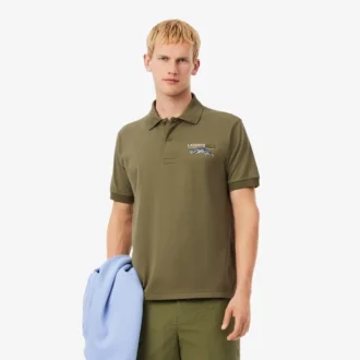 Polo da uomo in piqué con motivo ricamato e vestibilità classica Polo da uomo in piqué con motivo ricamato e vestibilità classica