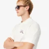 Polo da uomo in piqué con motivo ricamato e vestibilità classica Polo da uomo in piqué con motivo ricamato e vestibilità classica