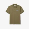 Polo da uomo in piqué con motivo ricamato e vestibilità classica Polo da uomo in piqué con motivo ricamato e vestibilità classica