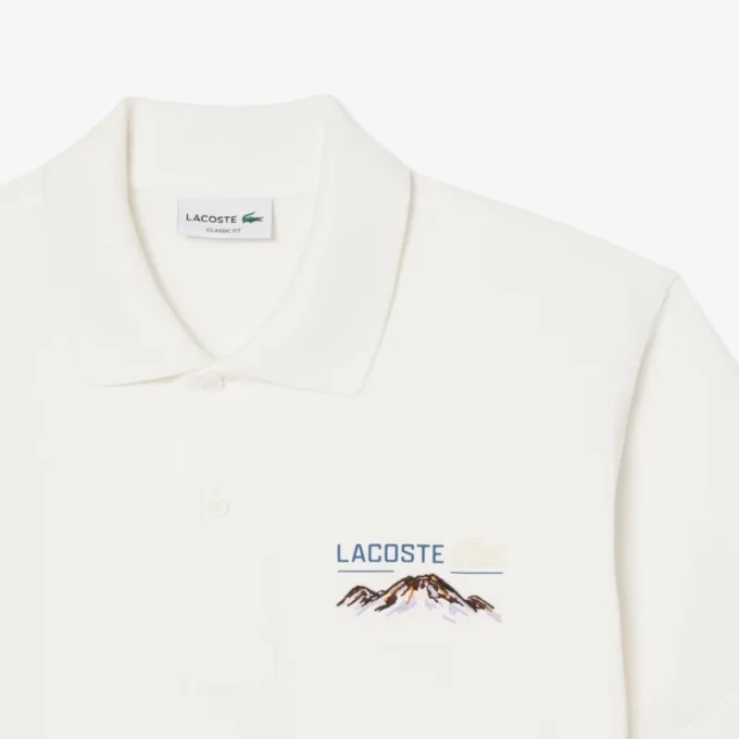 Polo da uomo in piqué con motivo ricamato e vestibilità classica Polo da uomo in piqué con motivo ricamato e vestibilità classica