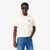 Polo da uomo L.12.12 con taschino e vestibilità classica Polo da uomo L.12.12 con taschino e vestibilità classica