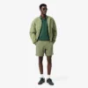 Polo da uomo L.12.12 con taschino e vestibilità classica Polo da uomo L.12.12 con taschino e vestibilità classica
