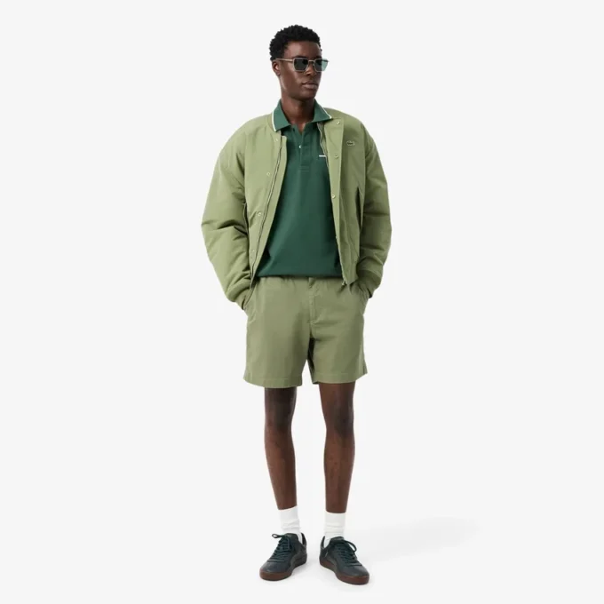 Polo da uomo L.12.12 con taschino e vestibilità classica Polo da uomo L.12.12 con taschino e vestibilità classica