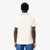Polo da uomo L.12.12 con taschino e vestibilità classica Polo da uomo L.12.12 con taschino e vestibilità classica