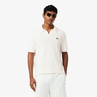 Polo in maglia bouclé dal taglio classico