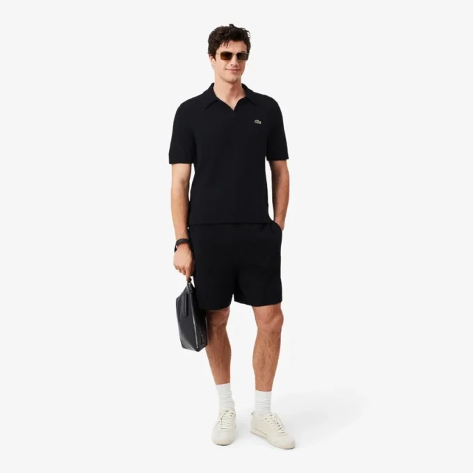 Polo in maglia bouclé dal taglio classico Polo in maglia bouclé dal taglio classico