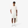 Polo in maglia bouclé dal taglio classico Polo in maglia bouclé dal taglio classico