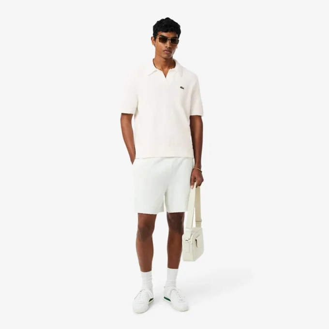 Polo in maglia bouclé dal taglio classico Polo in maglia bouclé dal taglio classico
