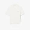 Polo in maglia bouclé dal taglio classico Polo in maglia bouclé dal taglio classico