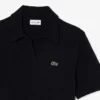 Polo in maglia bouclé dal taglio classico Polo in maglia bouclé dal taglio classico