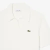 Polo in maglia bouclé dal taglio classico Polo in maglia bouclé dal taglio classico