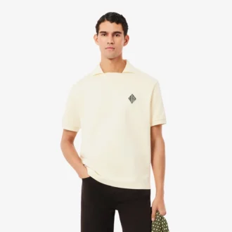 Polo in pile dalla vestibilità ampia con badge