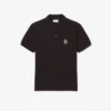 Polo in piqué con badge e vestibilità classica Polo in piqué con badge e vestibilità classica