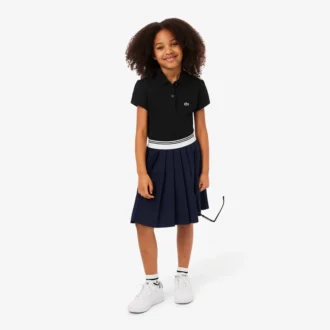 Polo in piqué con collo smerlato da bambina